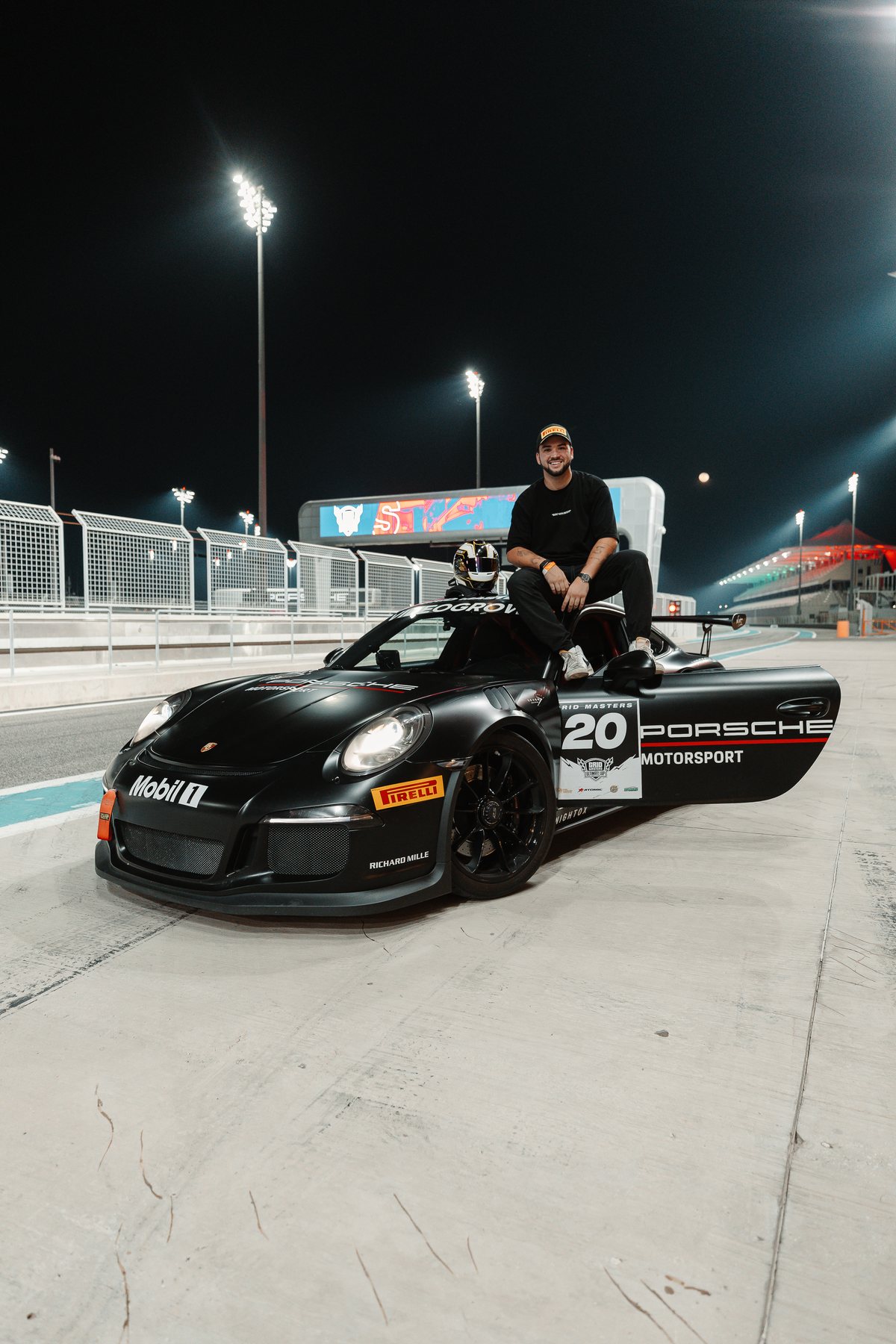Elliott on the roof of the car